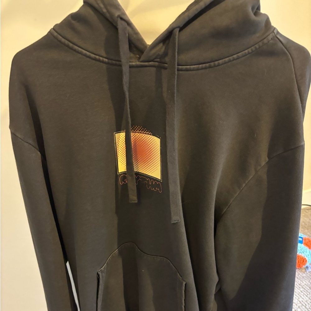 Rhythm Black Hoodie with Graphic Detail